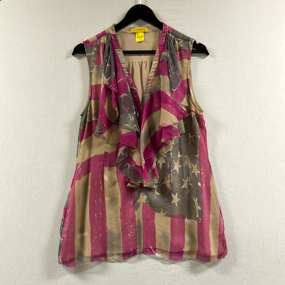 Hot pink and gray top with stars and stripe pattern.